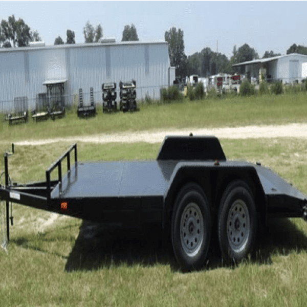 Black flatbed utility trailer on grassy lot