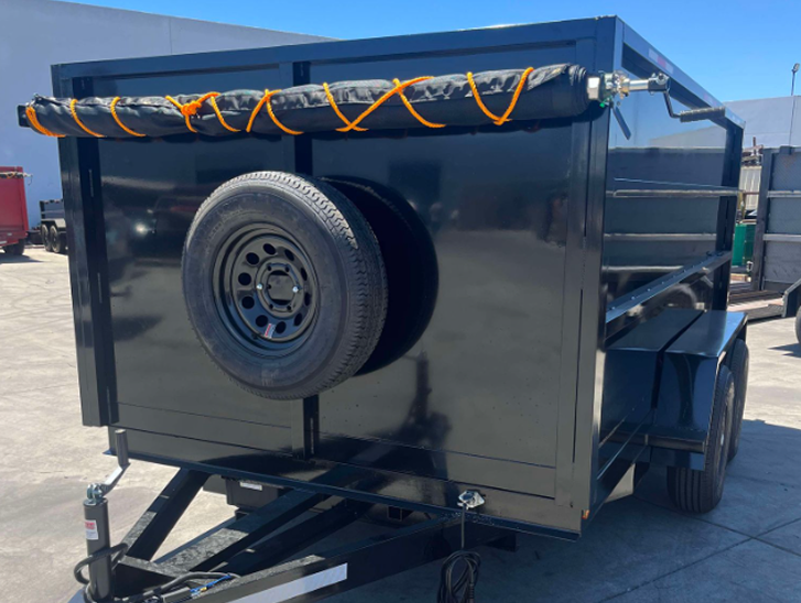 Black utility trailer with spare tire